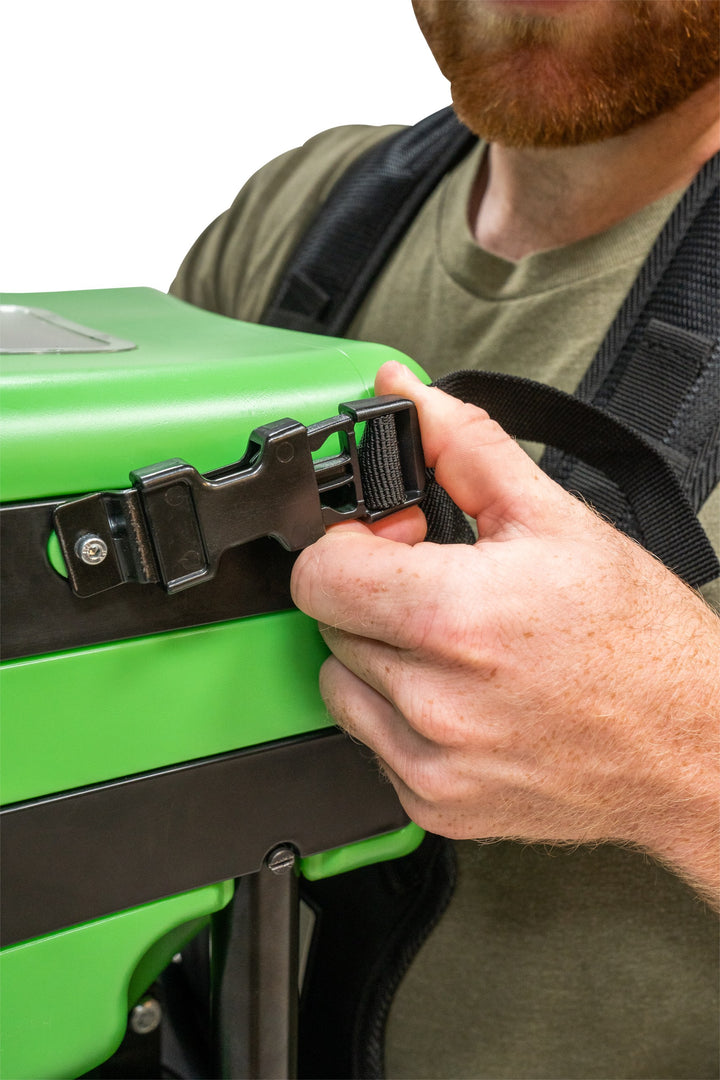 Filling the Hooyman manual chest spreader hopper