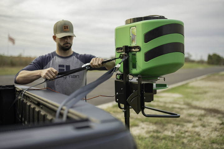 Hooyman 125 lb vehicle spreader mounted to a 2-inch hitch receiver